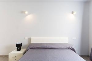 Voodi või voodid majutusasutuse Torres del Sol toas