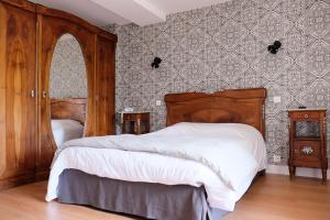 Postel nebo postele na pokoji v ubytování hôtel Piellenia