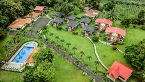 an aerial view of a resort with a swimming pool at Hotel Eco Arenal in Fortuna