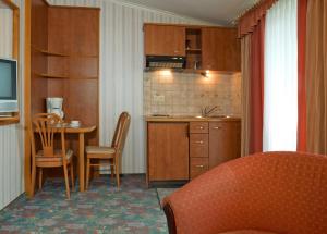 Kuchyň nebo kuchyňský kout v ubytování Hotel Pension Fent