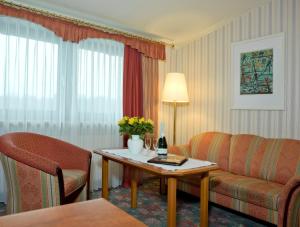 Posezení v ubytování Hotel Pension Fent