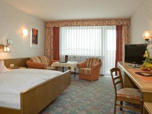 Postel nebo postele na pokoji v ubytování Hotel Pension Fent