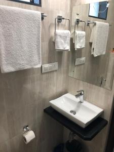 Koupelna v ubytování Hotel Antique - Colaba