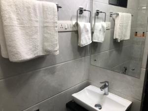 Koupelna v ubytování Hotel Antique - Colaba
