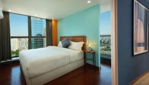 Katil atau katil-katil dalam bilik di Royal Star Apartment(Guangzhou Central City Branch)