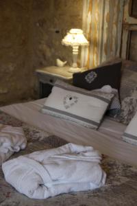 Un ou plusieurs lits dans un hébergement de l'établissement La Bastide des Songes - Demeure d'hôtes