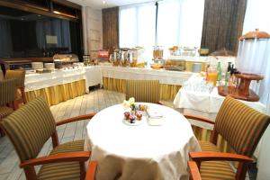 TV a/nebo společenská místnost v ubytování Hotel Cicolella