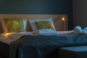 Postel nebo postele na pokoji v ubytování Fast Hotel Svolvær