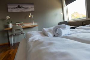 Postel nebo postele na pokoji v ubytování Fast Hotel Svolvær