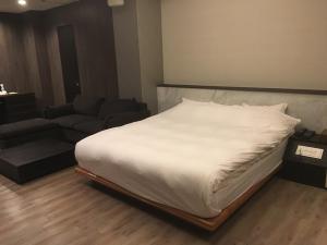 Postel nebo postele na pokoji v ubytování N hotel #NL1