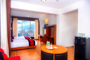 Rúm í herbergi á Hotel City Inn - Mountain View