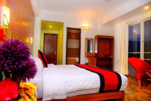 Rúm í herbergi á Hotel City Inn - Mountain View
