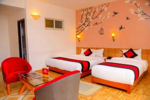 Rúm í herbergi á Hotel City Inn - Mountain View