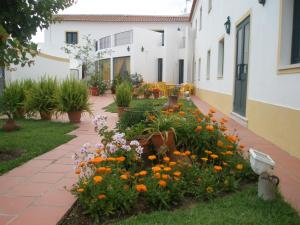 A garden outside Hotel Passagem do Sol