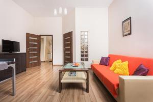 TV a/nebo společenská místnost v ubytování Luxor