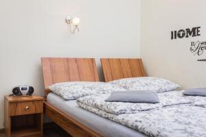 Postel nebo postele na pokoji v ubytování Luxor