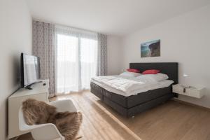 Säng eller sängar i ett rum på Villa Granitzblick, modernes Haus mit Terrasse in Binz