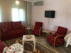 TV a/nebo společenská místnost v ubytování Seaside Villas Rental