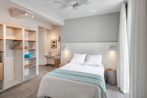 Letto o letti in una camera di The Bay