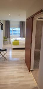 Postel nebo postele na pokoji v ubytování Apotek Guesthouse