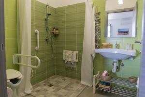 Un baño de MareinSicilia: Talia Residence