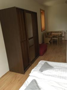 Postel nebo postele na pokoji v ubytování Holiday Park Vrchlabí - Liščí farma