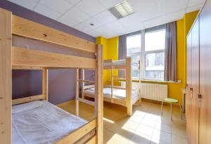Postel nebo postele na pokoji v ubytování Plus Prague