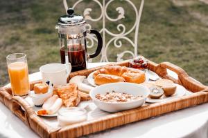 a tray of breakfast food on a table at Little Manor in Cheltenham