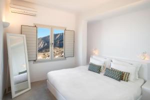 Postelja oz. postelje v sobi nastanitve Skyfall Suites - Adults Only