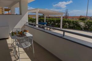 Un balcón o terraza en MareinSicilia: Talia Residence