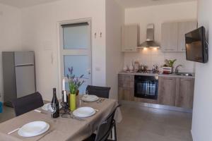 Una cocina o kitchenette en MareinSicilia: Talia Residence