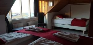 Postel nebo postele na pokoji v ubytování Apotek Guesthouse