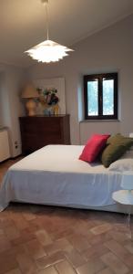 Ένα ή περισσότερα κρεβάτια σε δωμάτιο στο Villa delle Fonti di Portonovo