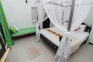 Postel nebo postele na pokoji v ubytování Aura