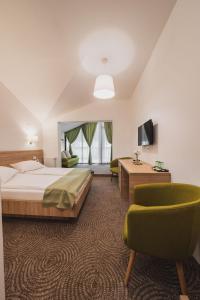 Ένα ή περισσότερα κρεβάτια σε δωμάτιο στο Hotel DADA Termal