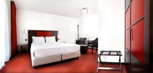Posteľ alebo postele v izbe v ubytovaní Hotel Holiday La Marca