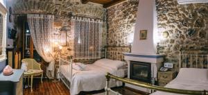 A bed or beds in a room at Arhontiko Kefalari
