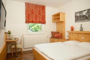 Posteľ alebo postele v izbe v ubytovaní Hubertushof Fromwald Hotel und Gasthof + 37 fotografií