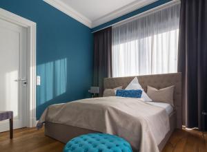 Postel nebo postele na pokoji v ubytování anders Kontorhaus Hotel