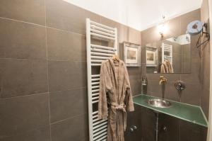 a bathroom with a sink and a towel at Agli incanti in Trieste