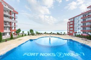 The swimming pool at or close to GT Marina & Panorama Fort Beach Apartments
