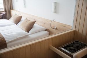 Postel nebo postele na pokoji v ubytování Hotel Waldegg - Adults only
