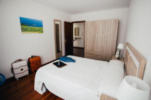 Cama o camas de una habitación en Apartamentos Alday