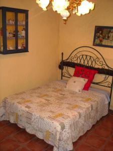 Cama o camas de una habitación en La Quinta del abuelo Félix