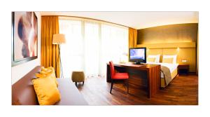 Ліжко або ліжка в номері Asia Hotel & Spa Leoben