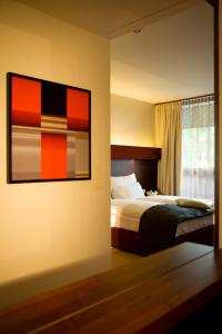 Ліжко або ліжка в номері Asia Hotel & Spa Leoben