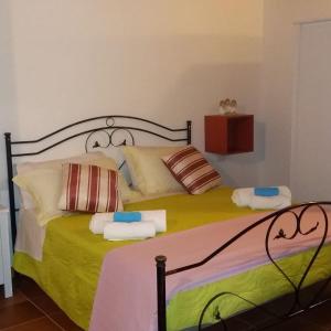 Posteľ alebo postele v izbe v ubytovaní B&B Le Anthos