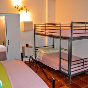 Posteľ alebo postele v izbe v ubytovaní B&B Le Anthos