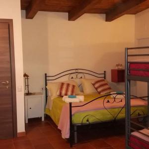 Posteľ alebo postele v izbe v ubytovaní B&B Le Anthos
