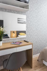 Posteľ alebo postele v izbe v ubytovaní City of the Kings-Silver Apartment No 2- Lubelska 10